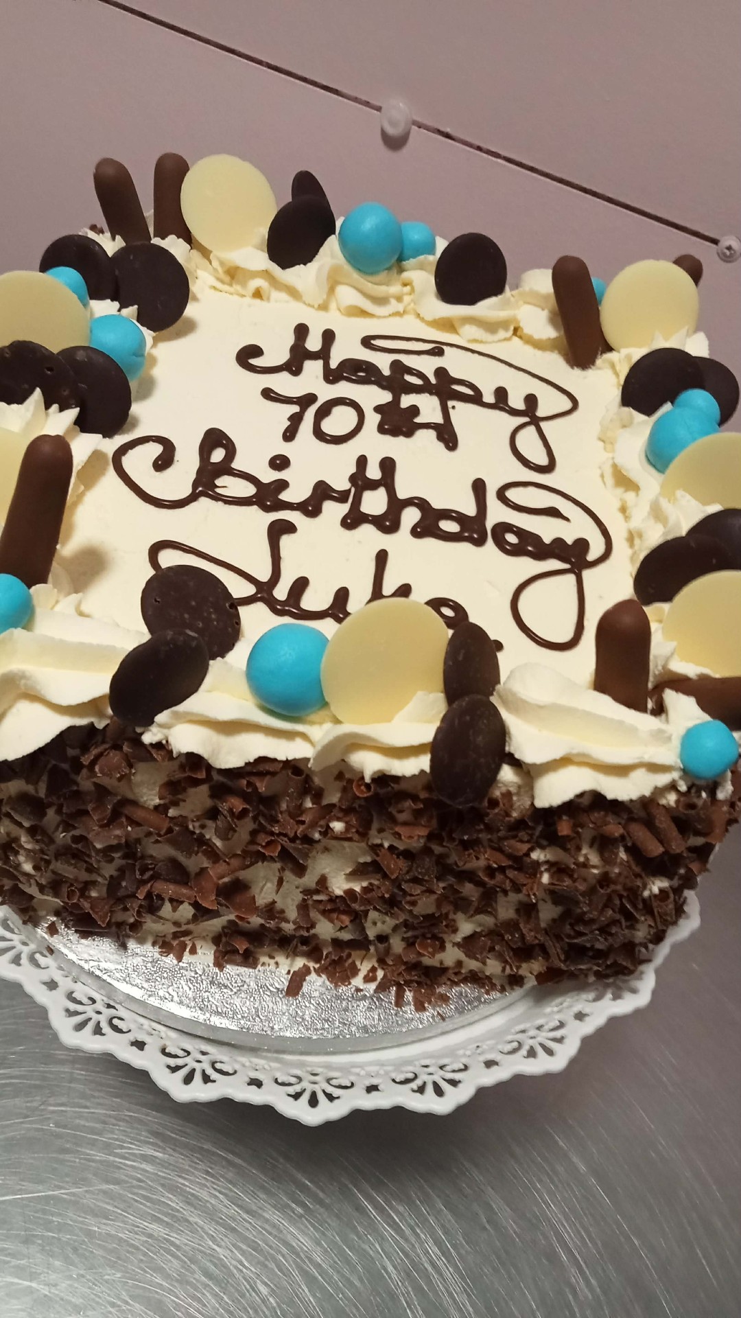 Chocolate Button Blue — simple celebration cake design